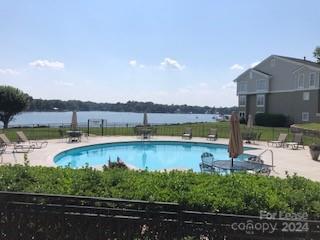 1328 Torrence Circle Davidson, NC 28036 - Photo 2 of 34 a view of a lake with a mountain