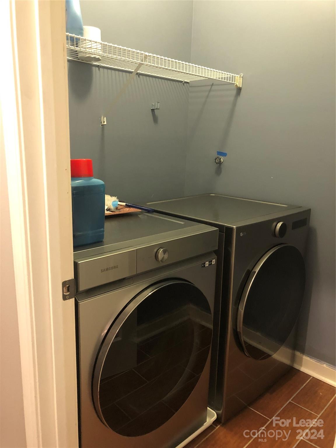 1328 Torrence Circle Davidson, NC 28036 - Photo 24 of 34 a utility room with dryer and washer