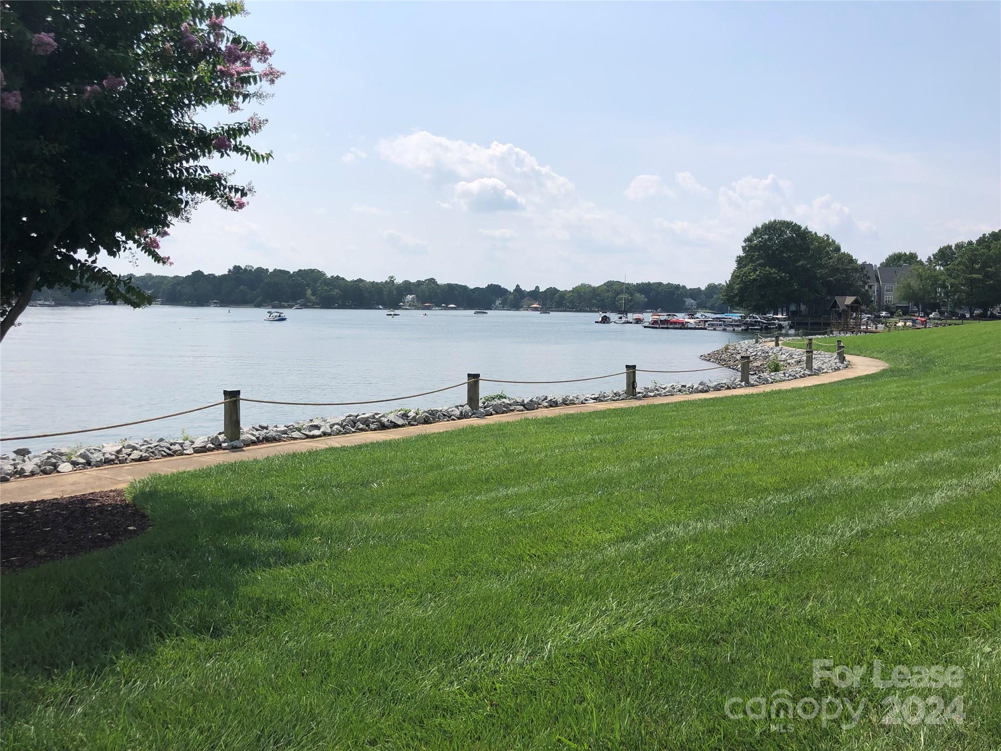 1328 Torrence Circle Davidson, NC 28036 - Photo 33 of 34 a view of a lake from a yard