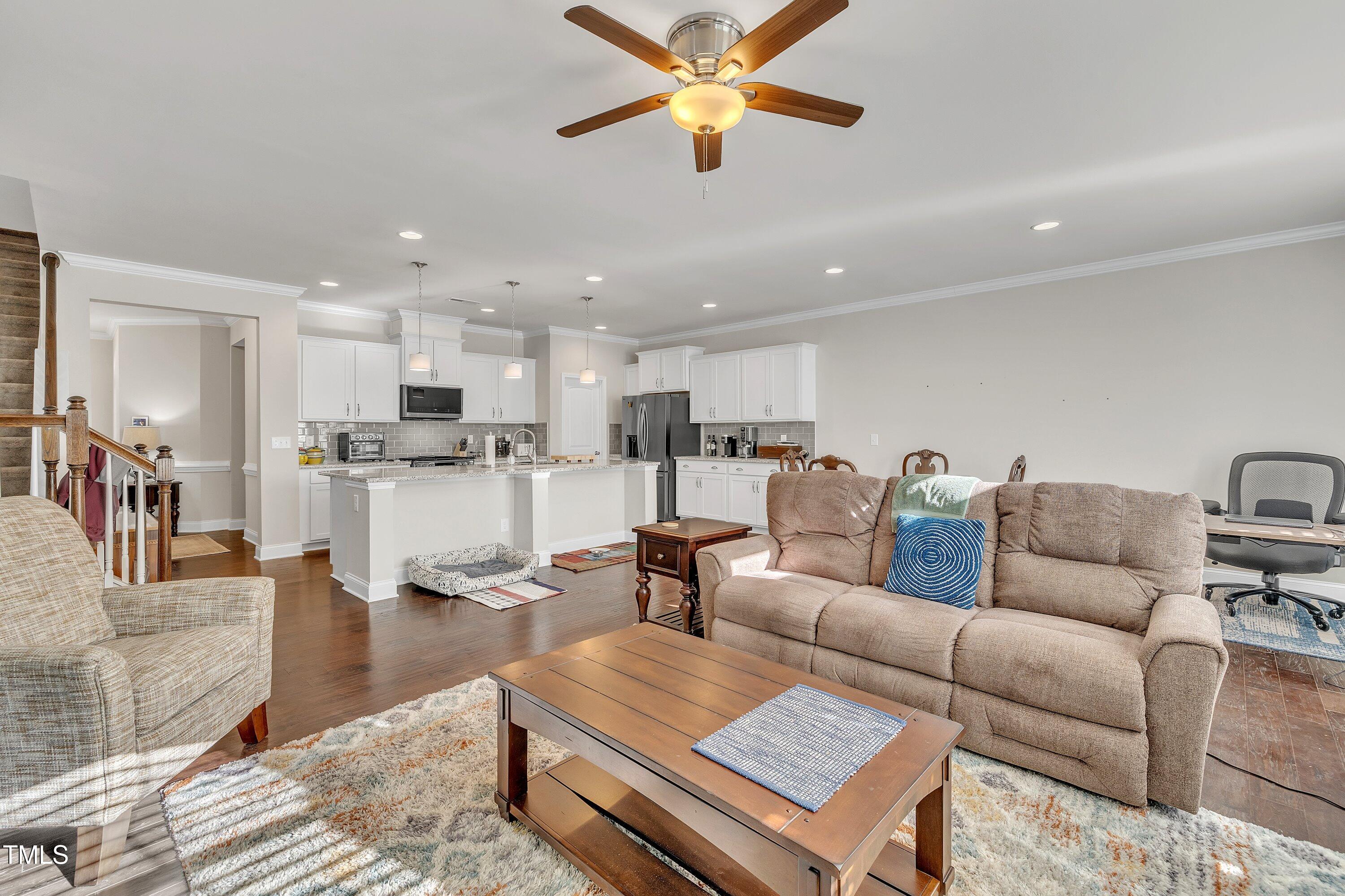 640 Newlyn Drive Raleigh, NC 27606 - Photo 20 of 44 a living room with furniture kitchen view and a kitchen view
