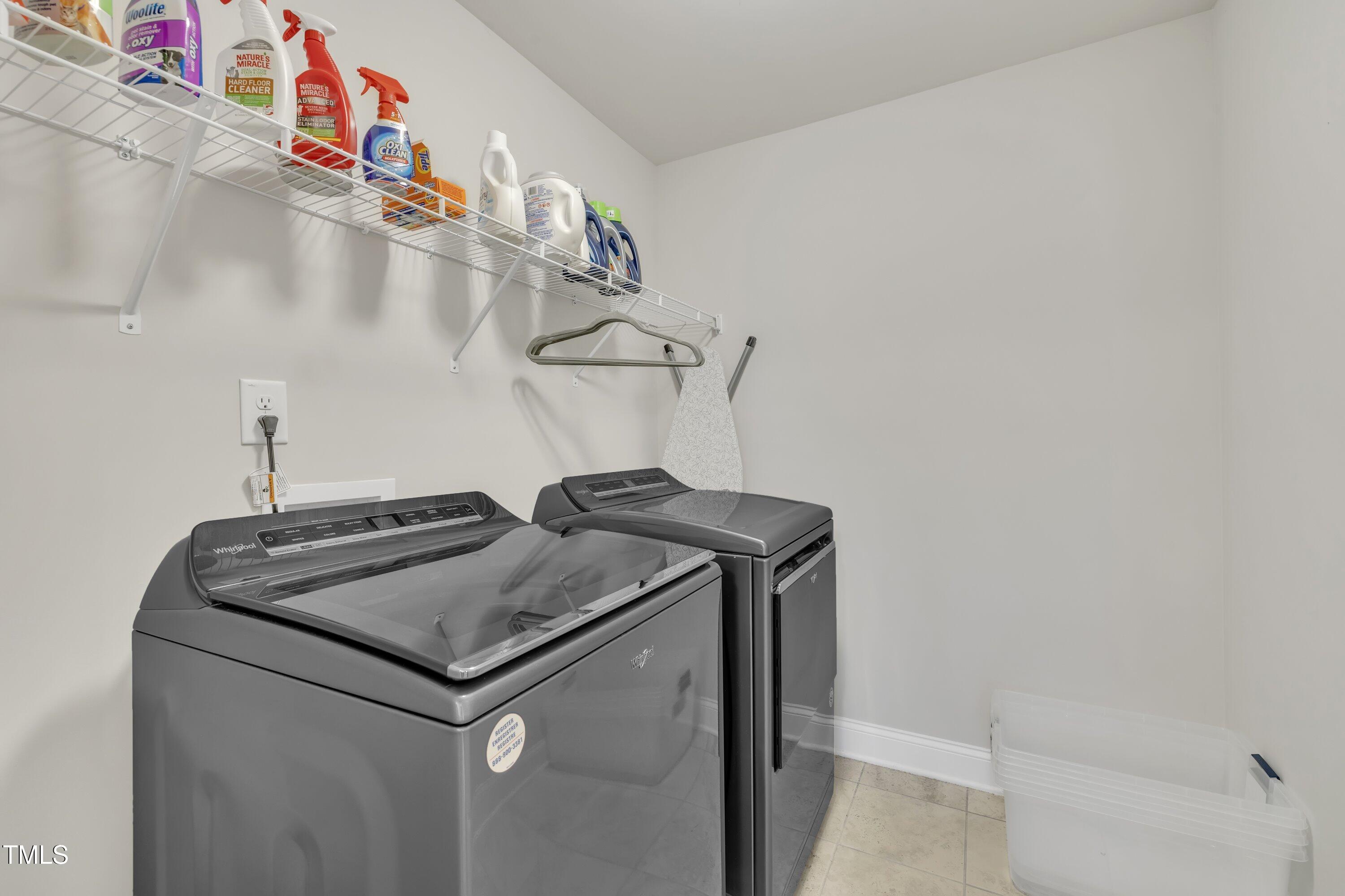 640 Newlyn Drive Raleigh, NC 27606 - Photo 32 of 44 a utility room with dryer and washer