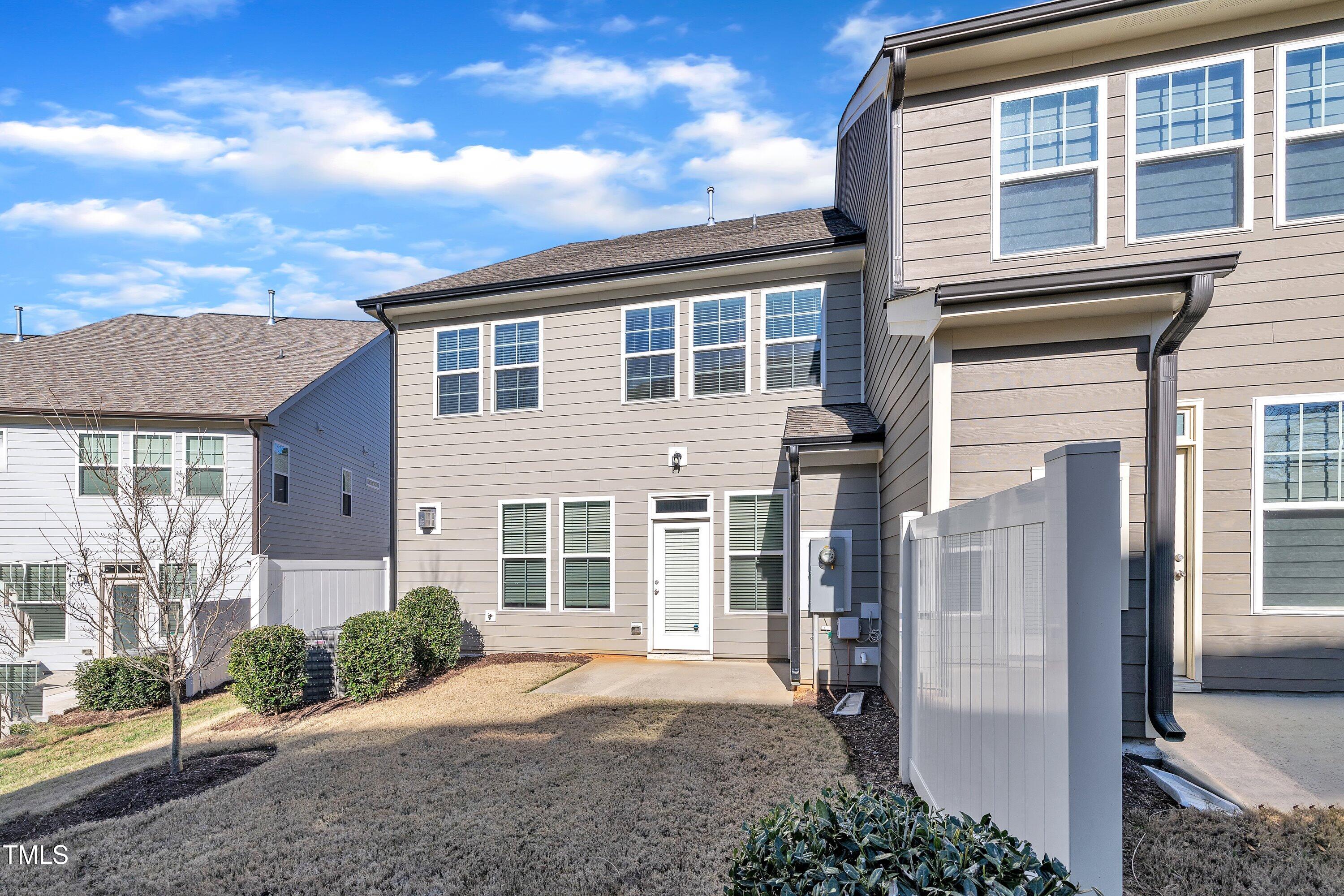 640 Newlyn Drive Raleigh, NC 27606 - Photo 41 of 44 front view of a house with a yard