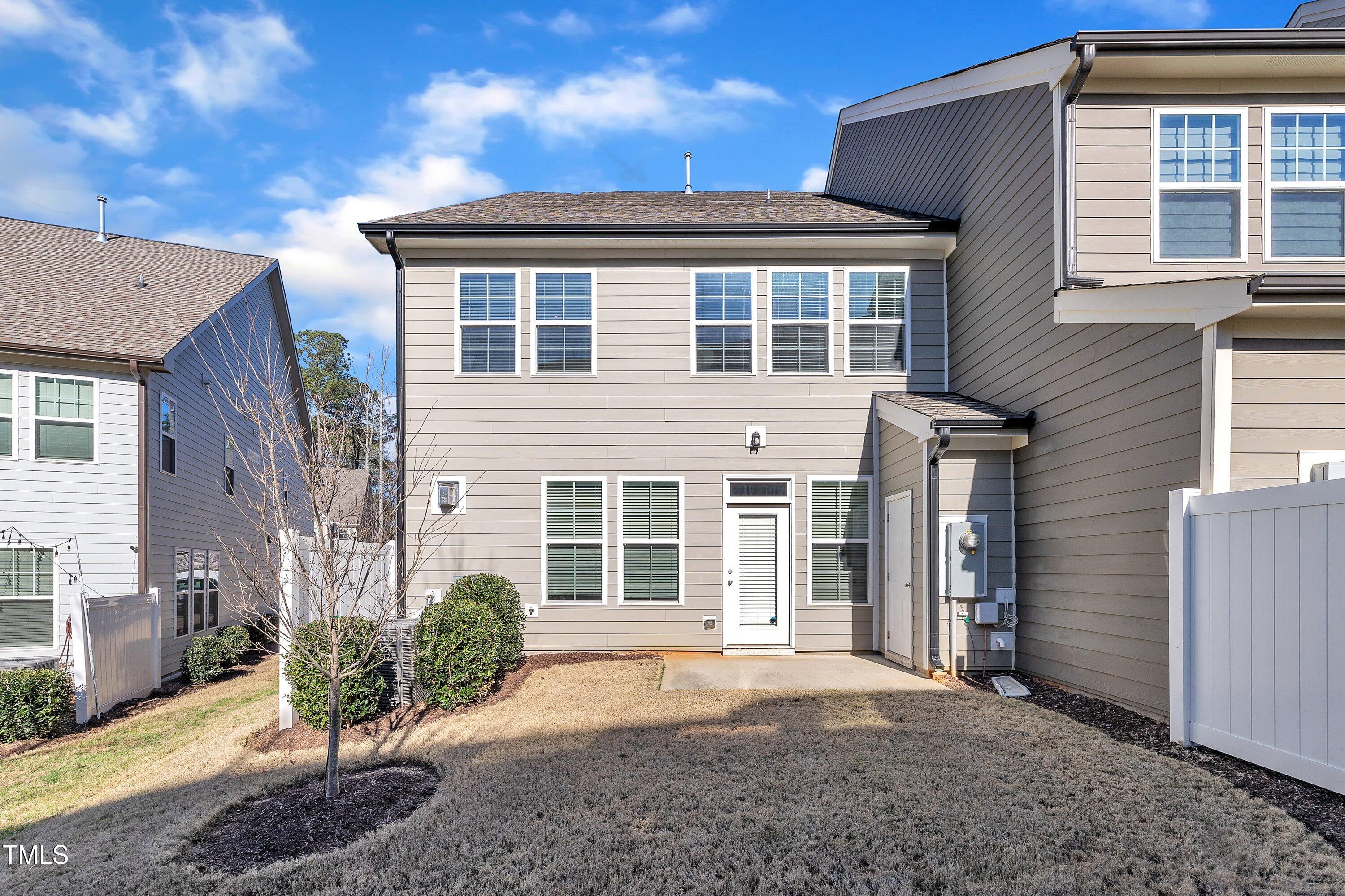 640 Newlyn Drive Raleigh, NC 27606 - Photo 42 of 44 a view of a house with a backyard