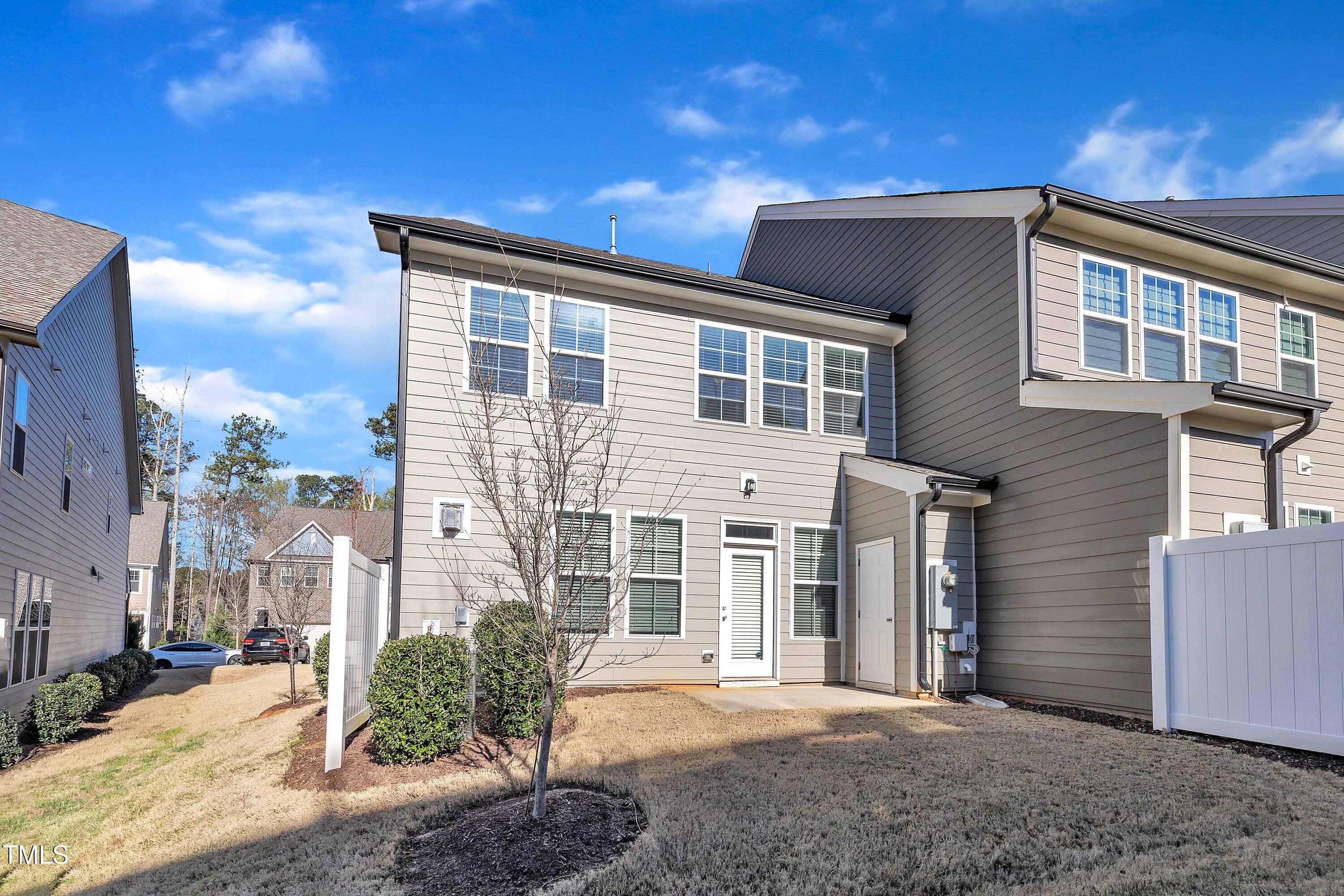 640 Newlyn Drive Raleigh, NC 27606 - Photo 43 of 44 a front view of a house with a yard
