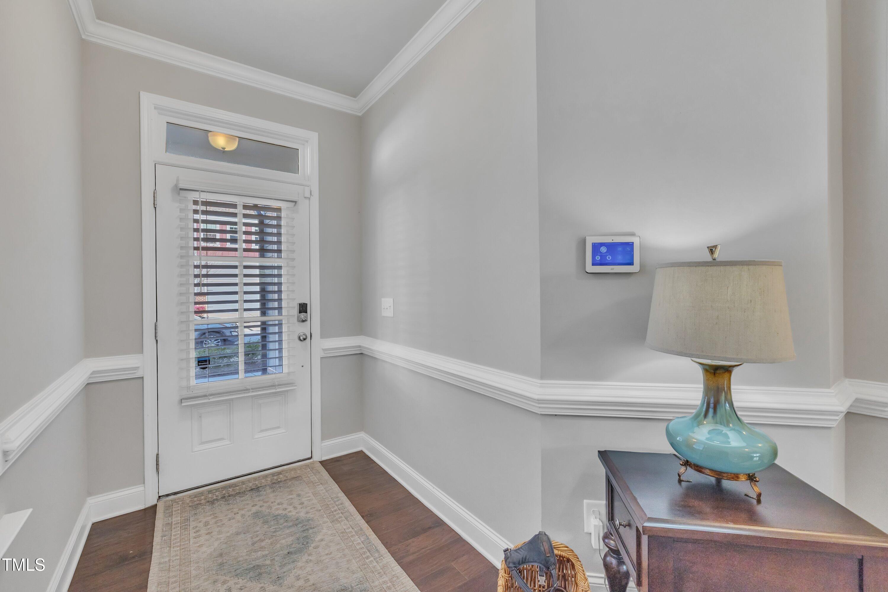 640 Newlyn Drive Raleigh, NC 27606 - Photo 6 of 44 a view of room with furniture and wooden floor