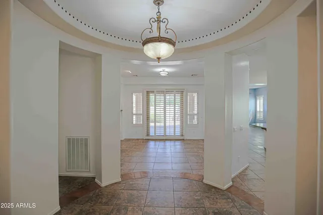 a bathroom with a sink mirror toilet and bathtub
