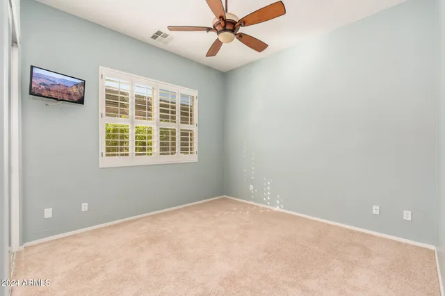a view of a house with a mountain in the background