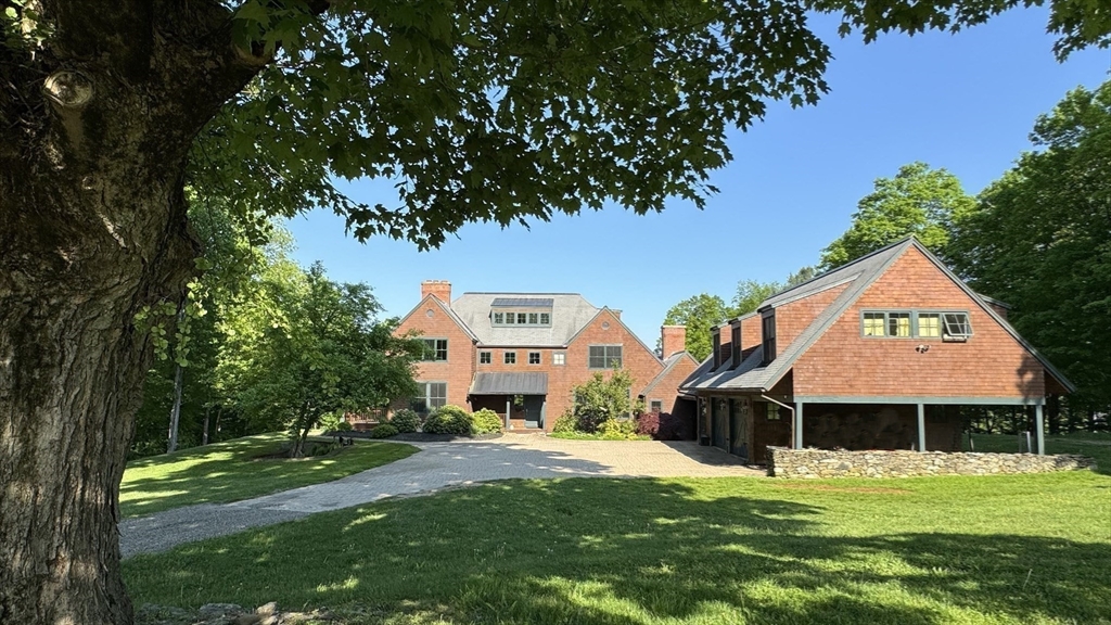 79 Freeman Road Charlton, MA 01507 - Photo 1 of 18 a front view of a house with a yard