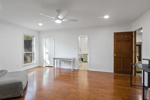 a view of livingroom with furniture wooden floor and window
