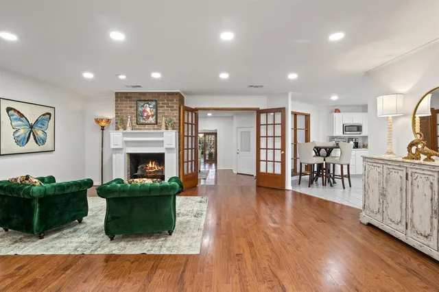 a lobby with furniture and a fireplace