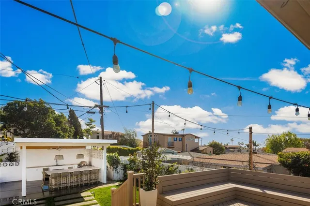a view of a hall way with furniture