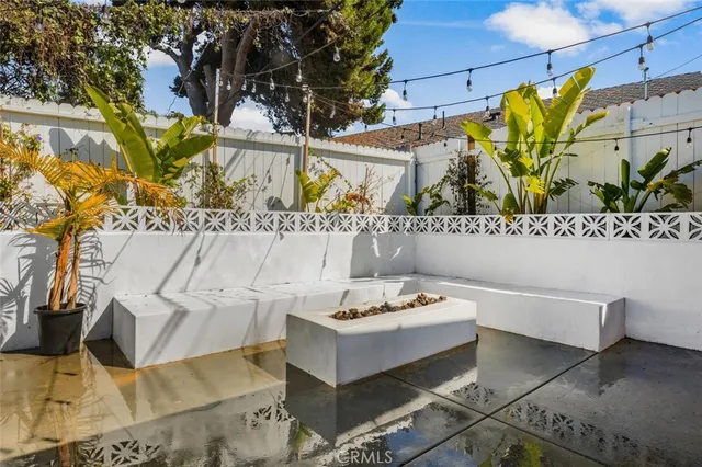 a bathroom with a sink mirror and vanity