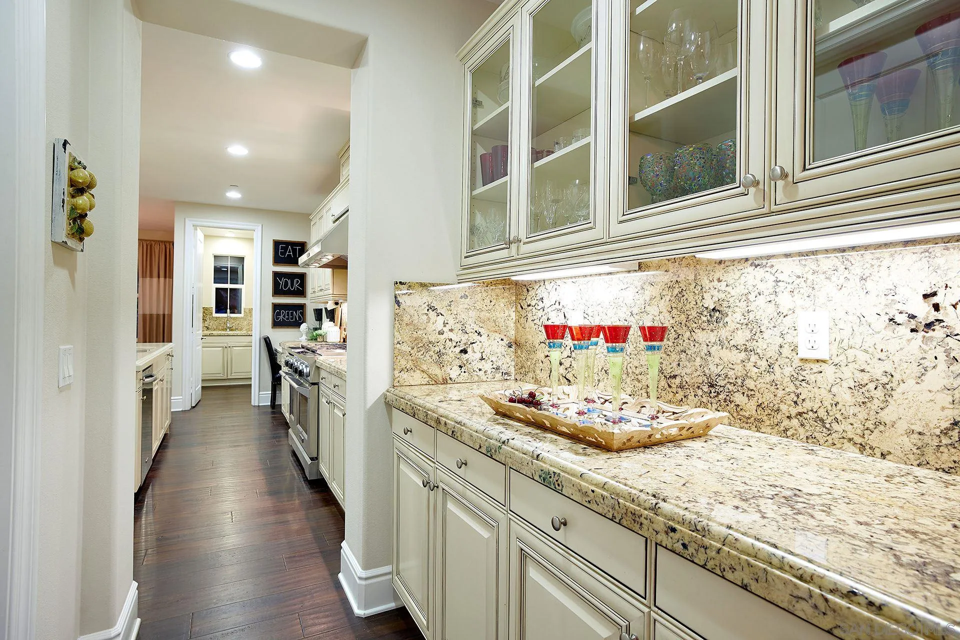 17778 Ralphs Ranch Road San Diego, CA 92127 - Photo 17 of 48 a kitchen with a sink and cabinets