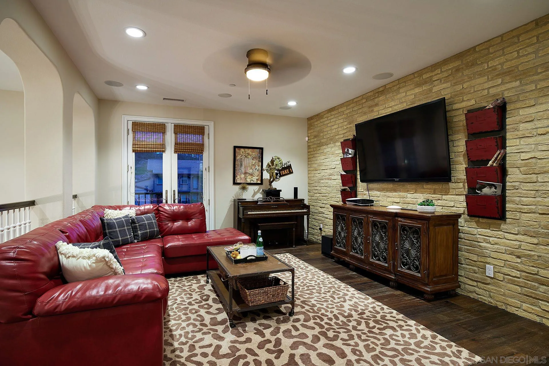 17778 Ralphs Ranch Road San Diego, CA 92127 - Photo 20 of 48 a living room with furniture and a flat screen tv