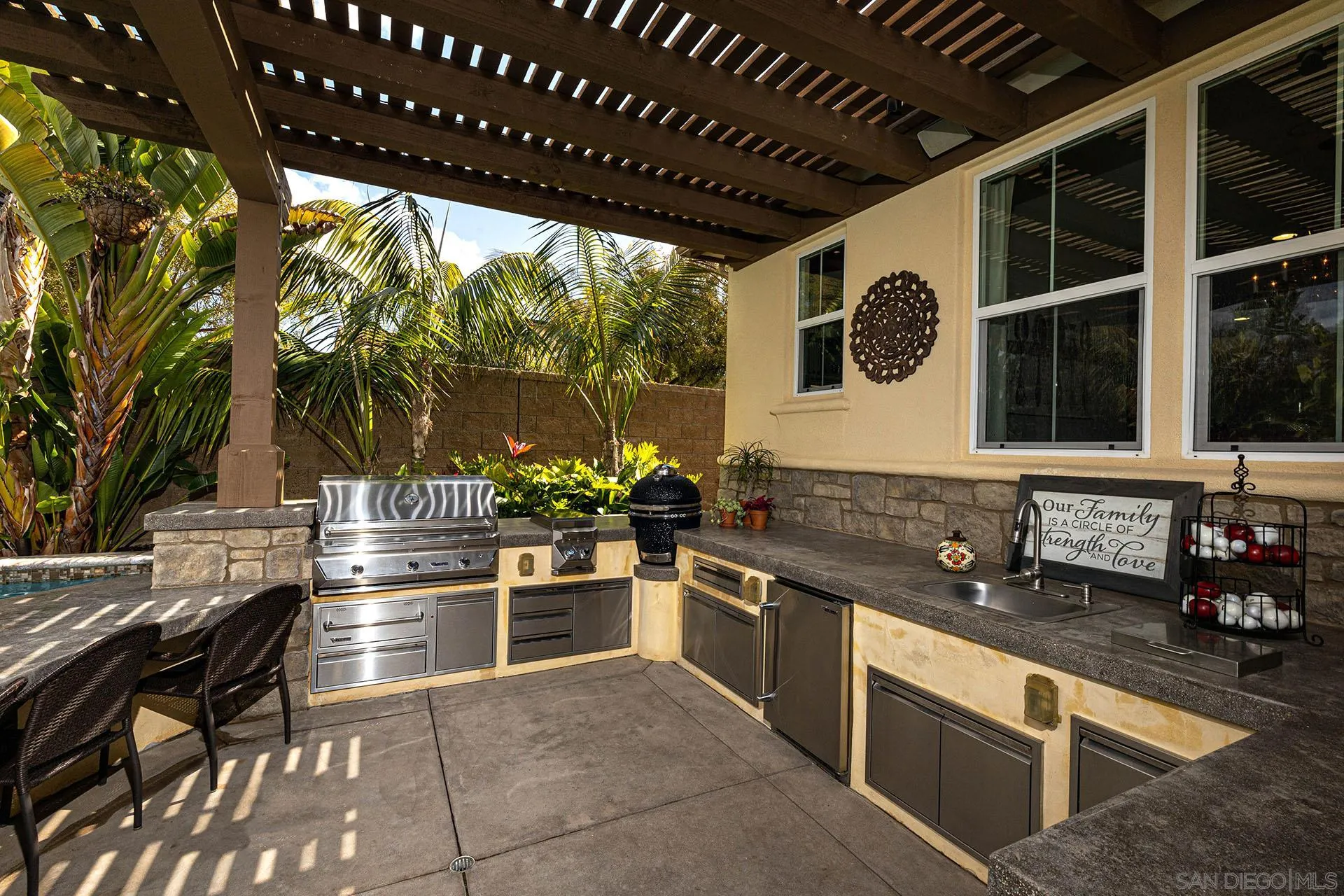 17778 Ralphs Ranch Road San Diego, CA 92127 - Photo 28 of 48 a kitchen with stainless steel appliances granite countertop a stove and a sink