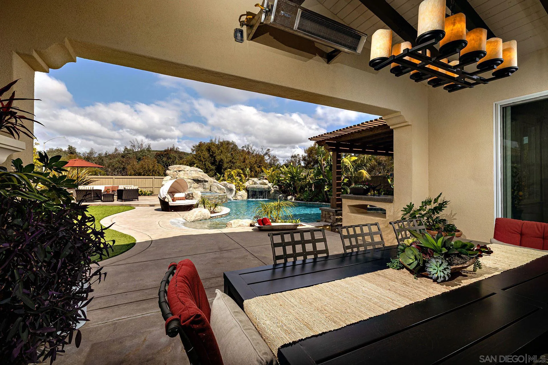 17778 Ralphs Ranch Road San Diego, CA 92127 - Photo 29 of 48 a view of a patio with a table and chairs
