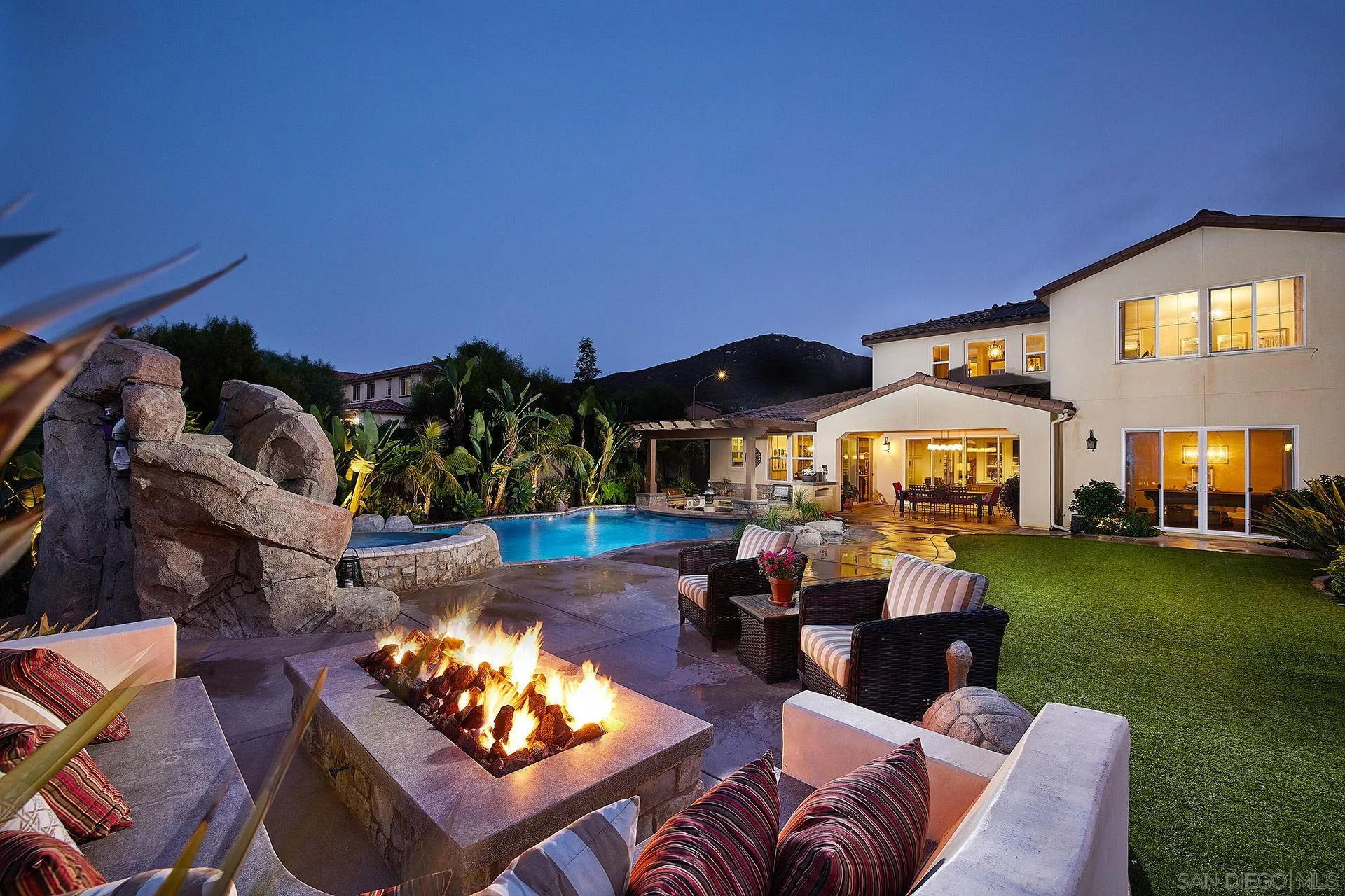 17778 Ralphs Ranch Road San Diego, CA 92127 - Photo 3 of 48 a view of a patio with couches table and chairs with plants and garden