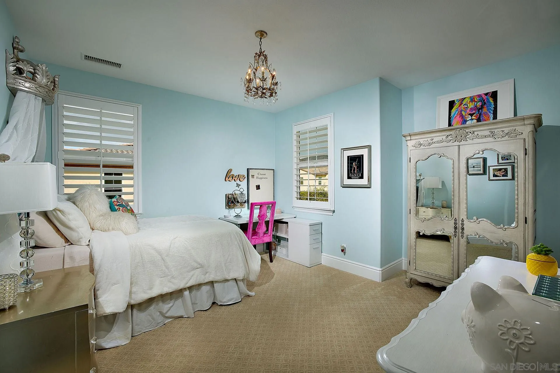 17778 Ralphs Ranch Road San Diego, CA 92127 - Photo 31 of 48 a bedroom with bed and a chandelier