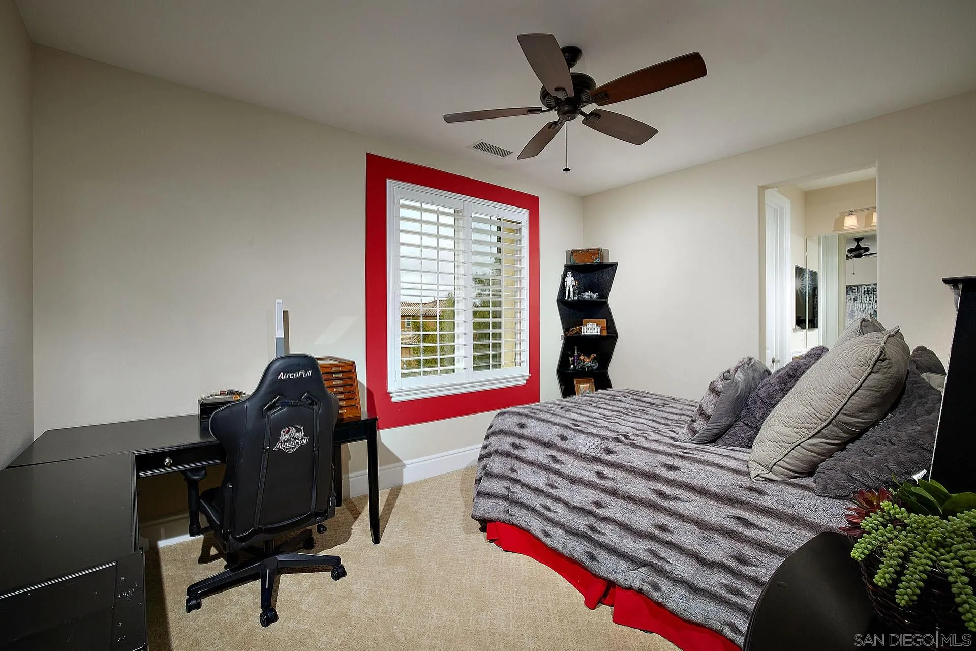 17778 Ralphs Ranch Road San Diego, CA 92127 - Photo 33 of 48 a bedroom with a bed and a chandelier