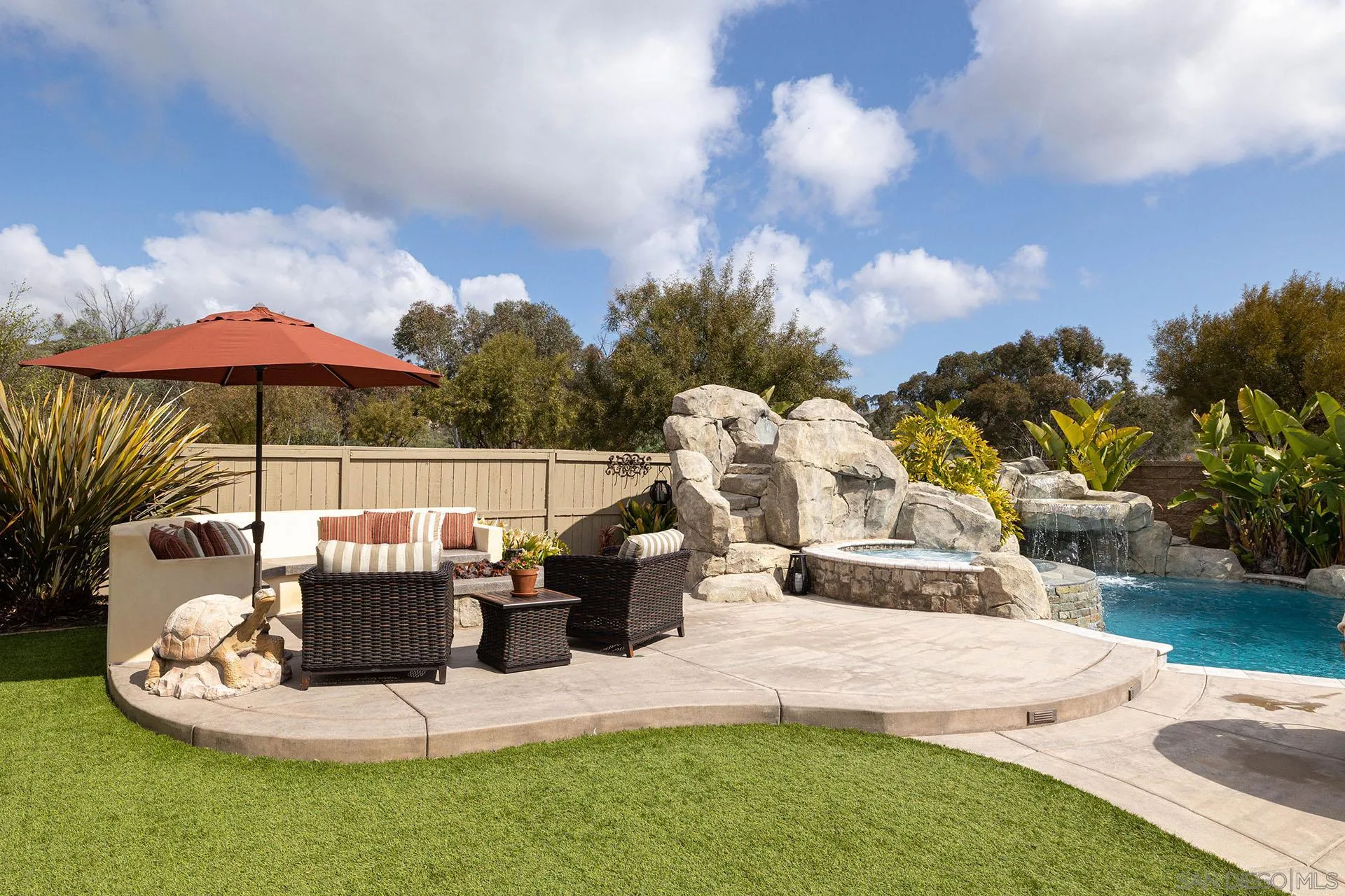 17778 Ralphs Ranch Road San Diego, CA 92127 - Photo 38 of 48 a view of a house with backyard porch and sitting area