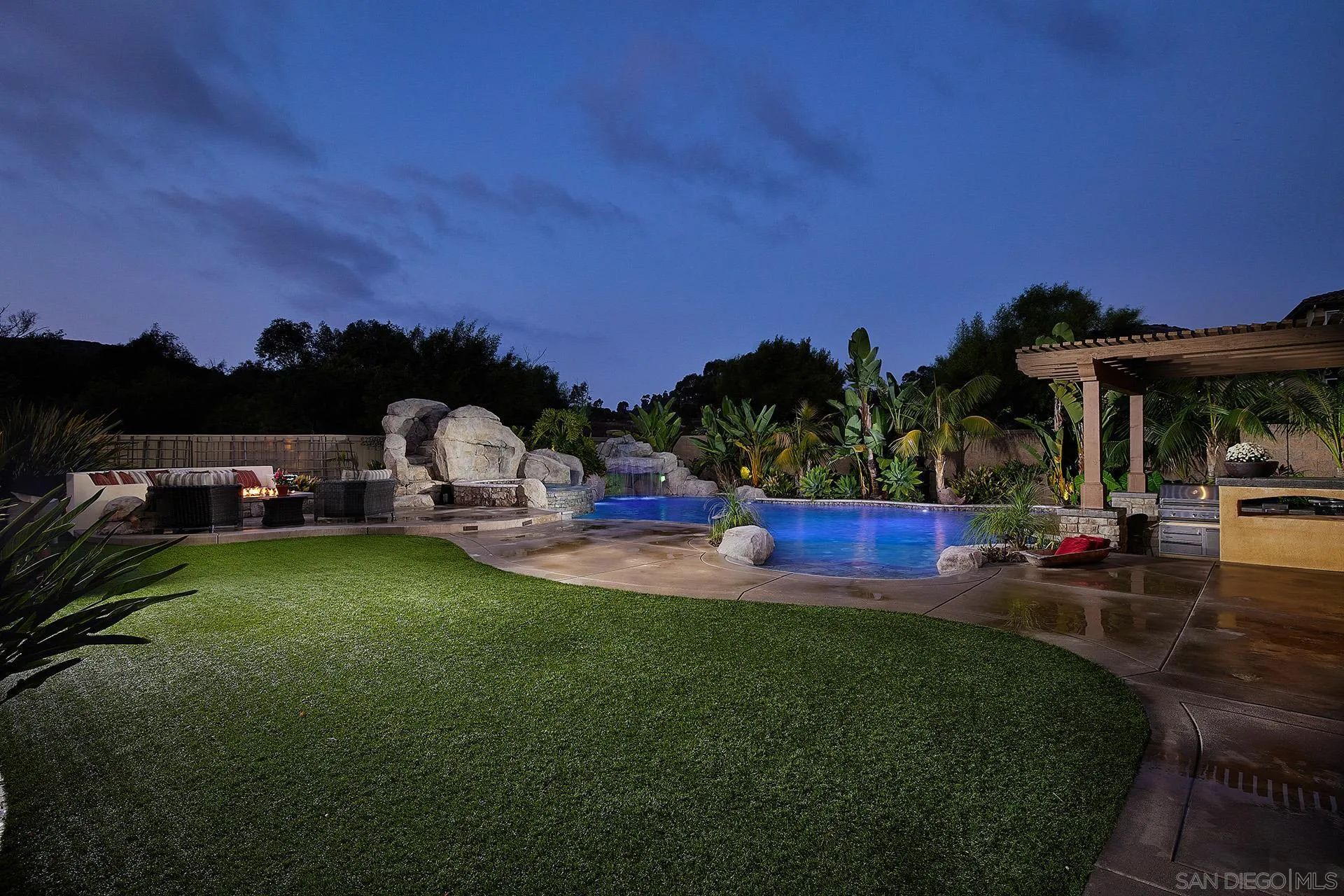17778 Ralphs Ranch Road San Diego, CA 92127 - Photo 4 of 48 a view of a house with backyard porch and sitting area