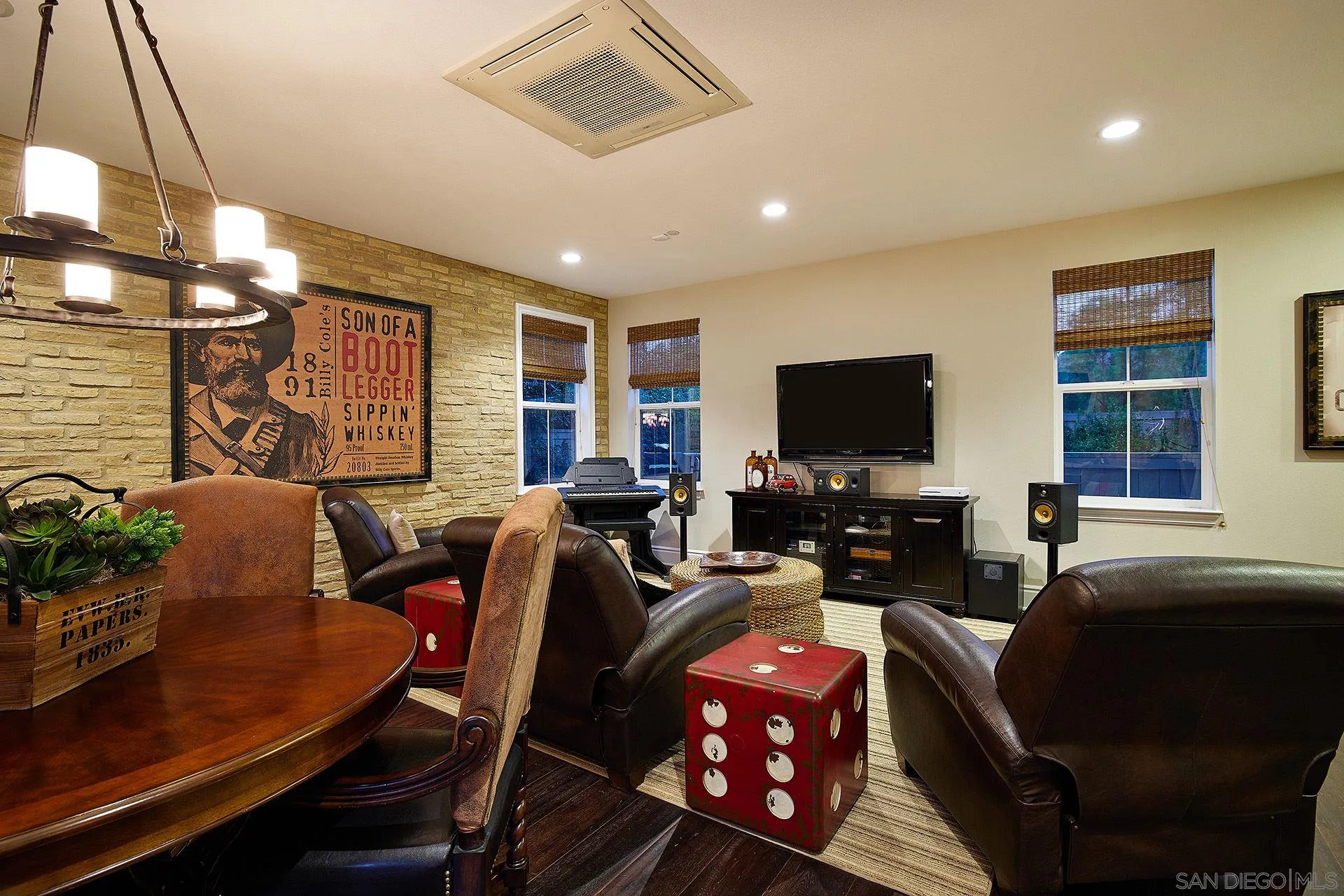 17778 Ralphs Ranch Road San Diego, CA 92127 - Photo 42 of 48 a living room with furniture and a flat screen tv