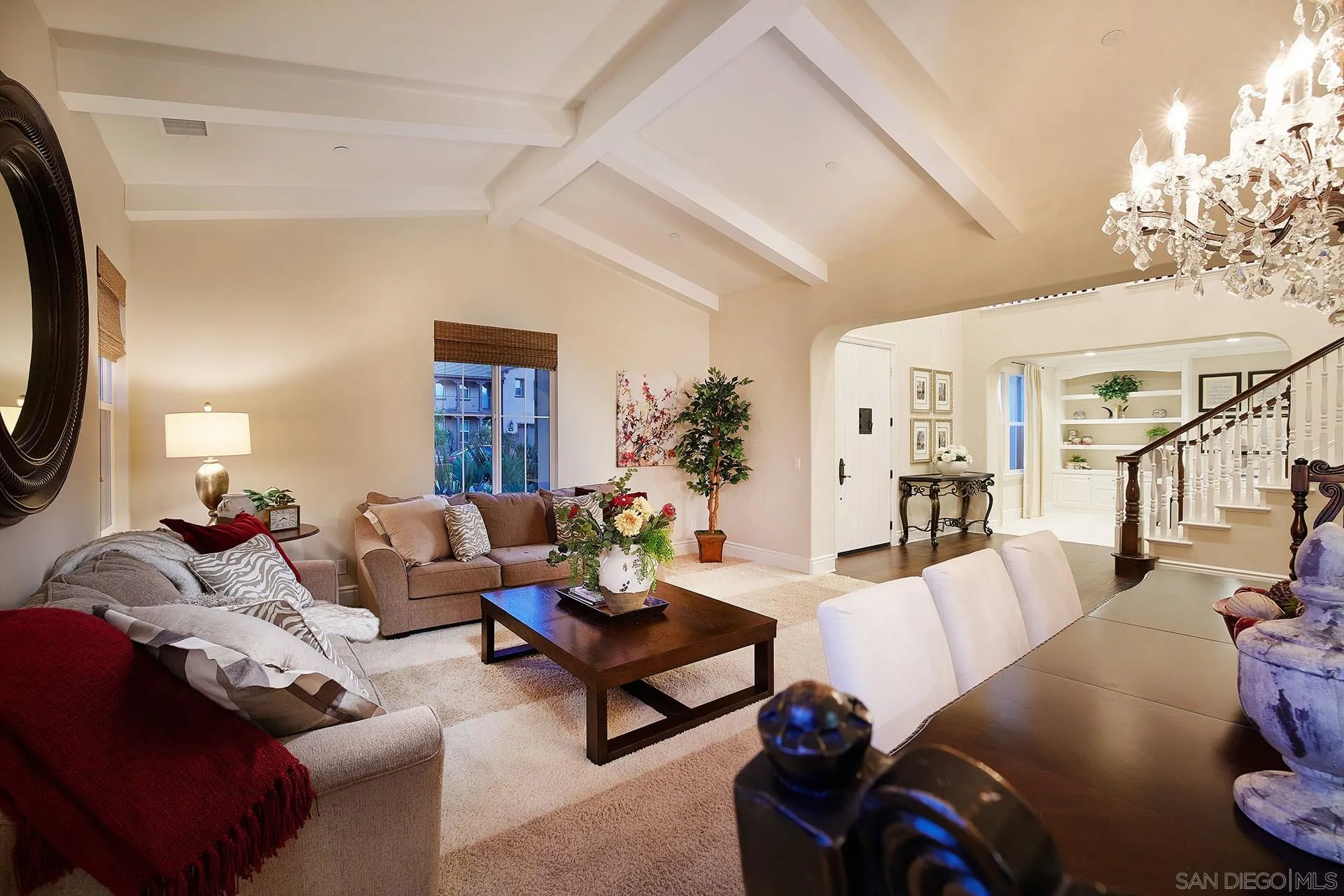 17778 Ralphs Ranch Road San Diego, CA 92127 - Photo 7 of 48 a living room with furniture a lamp wooden floor and a large window