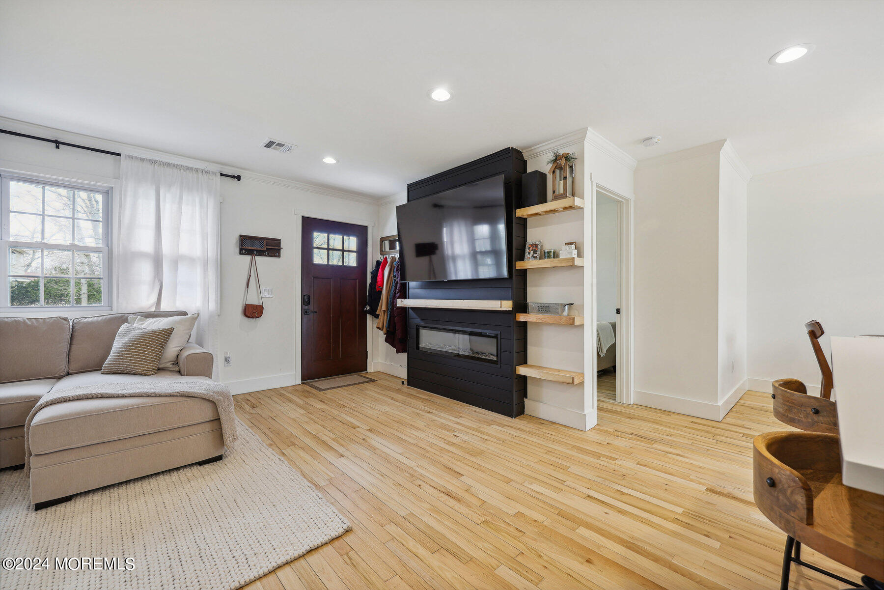 2572 Summit Road Manasquan, NJ 08736 - Photo 2 of 28 a large bedroom with a bed and furniture
