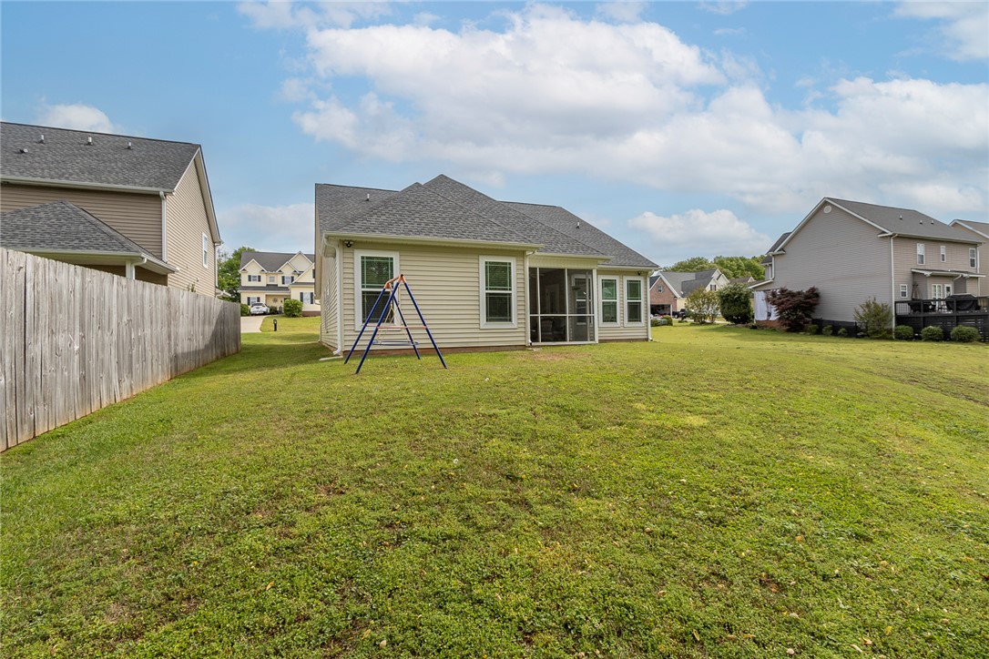 234 Streams Way Anderson, SC 29625 - Photo 44 of 44 This outdoor space offers a spacious yard with privacy fencing and a charming screened porch.