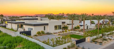 a room with furniture and a ceiling fan