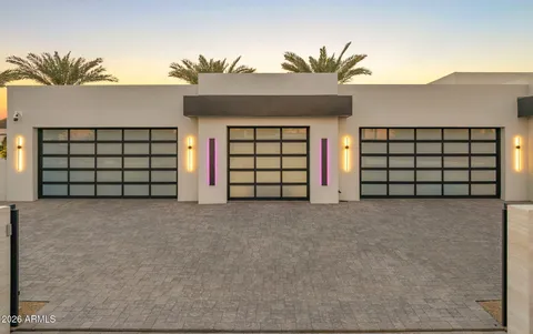 a dining area with furniture and a flat screen tv