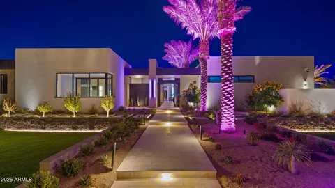 a kitchen with a sink and a refrigerator