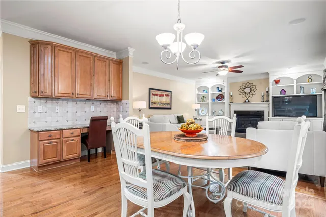 a bed room with furniture and a flat screen tv