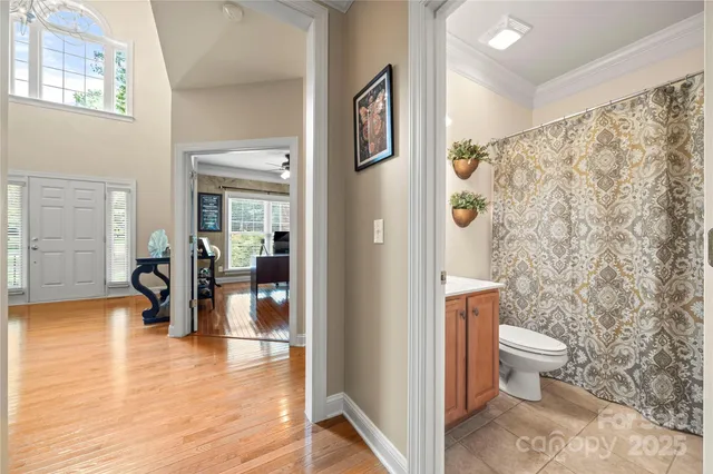 a spacious bathroom with a granite countertop sink mirror and
