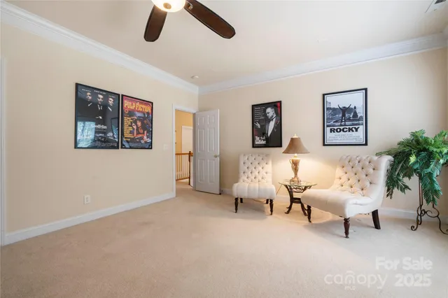 a spacious bedroom with a bed and a large window