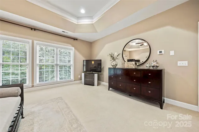 a view of a patio with table and chairs and wooden floor