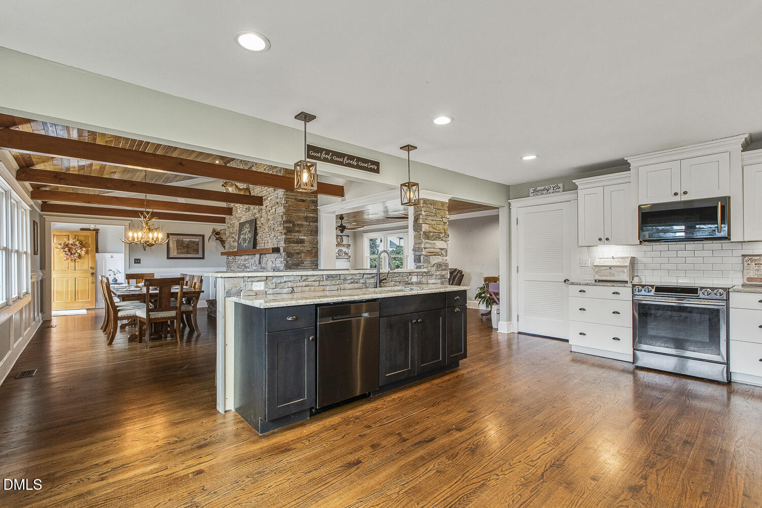 273 Wells Lane Angier, NC 27501 - Photo 15 of 52 a kitchen with stainless steel appliances granite countertop a stove and cabinets
