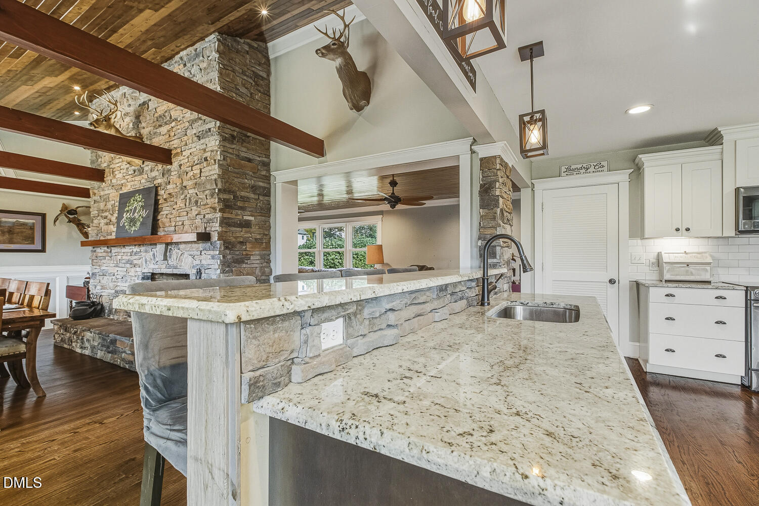 273 Wells Lane Angier, NC 27501 - Photo 18 of 52 a kitchen with stainless steel appliances granite countertop sink stove and refrigerator