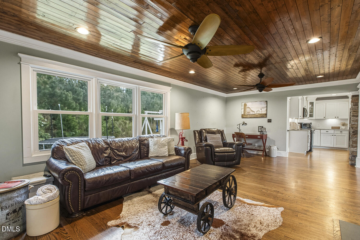 273 Wells Lane Angier, NC 27501 - Photo 21 of 52 a living room with furniture and a large window