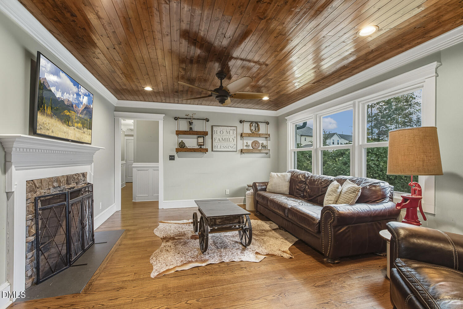 273 Wells Lane Angier, NC 27501 - Photo 22 of 52 a living room with furniture and a fireplace