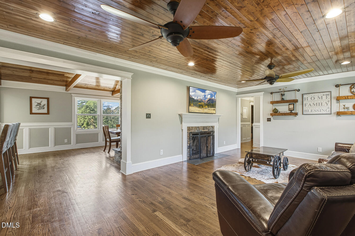 273 Wells Lane Angier, NC 27501 - Photo 25 of 52 a living room with furniture and a fireplace