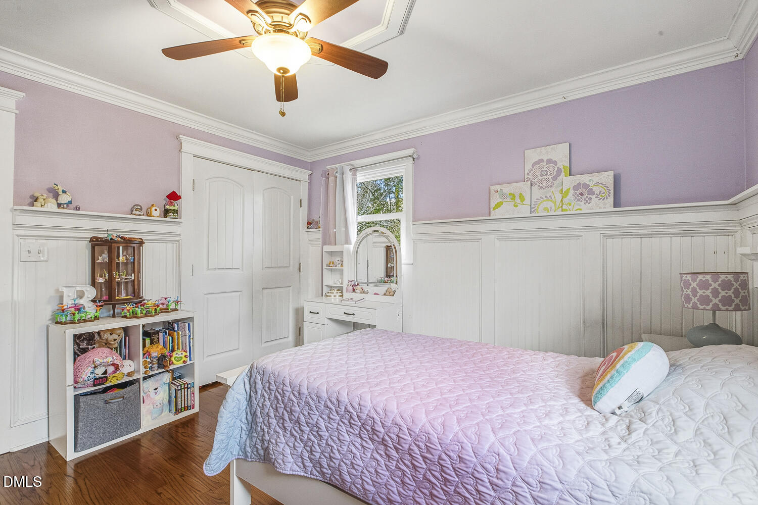 273 Wells Lane Angier, NC 27501 - Photo 32 of 52 a bedroom with a bed cabinets and book shelf
