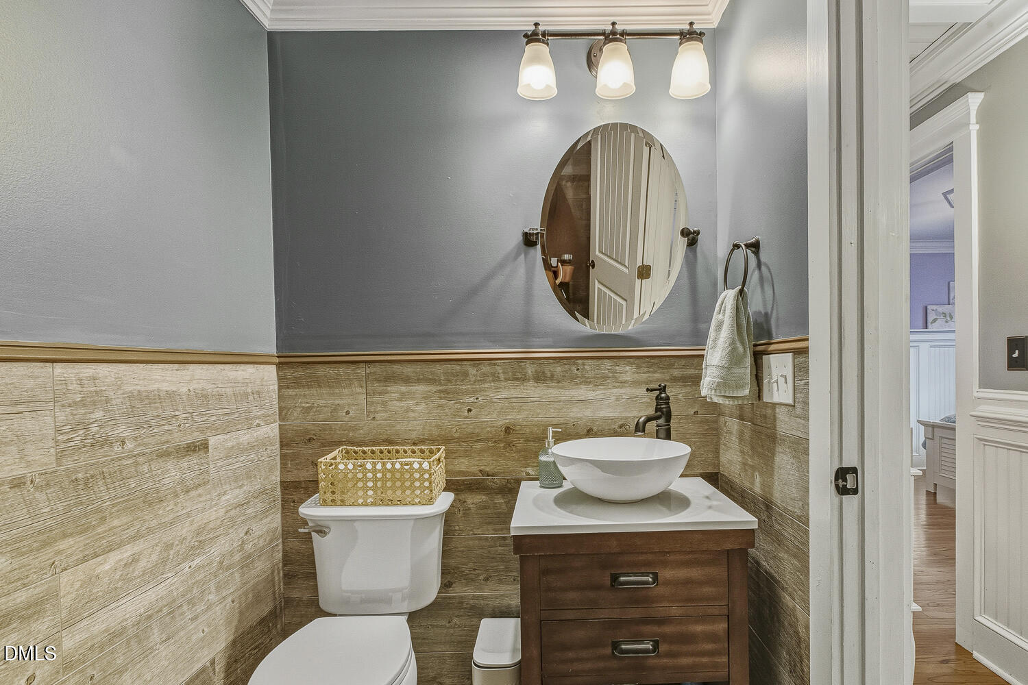 273 Wells Lane Angier, NC 27501 - Photo 33 of 52 a bathroom with a toilet sink and mirror