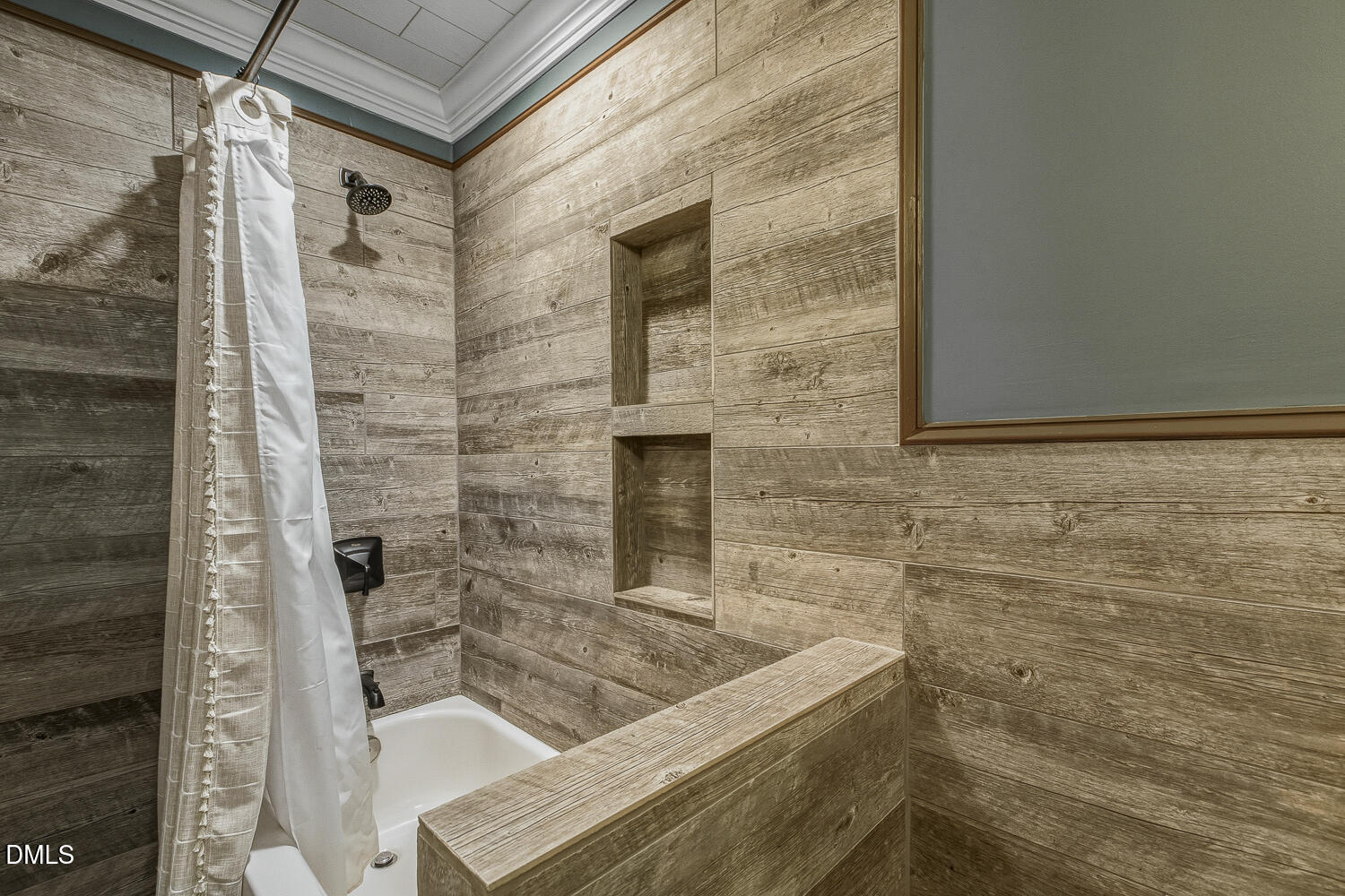 273 Wells Lane Angier, NC 27501 - Photo 34 of 52 a bathroom with a tub and shower
