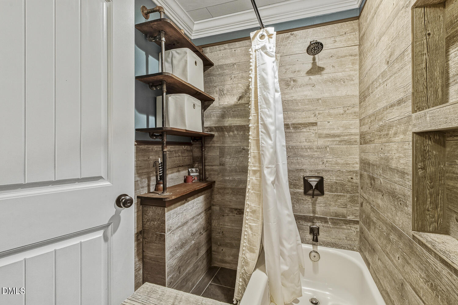 273 Wells Lane Angier, NC 27501 - Photo 35 of 52 a bathroom with a shower and a sink
