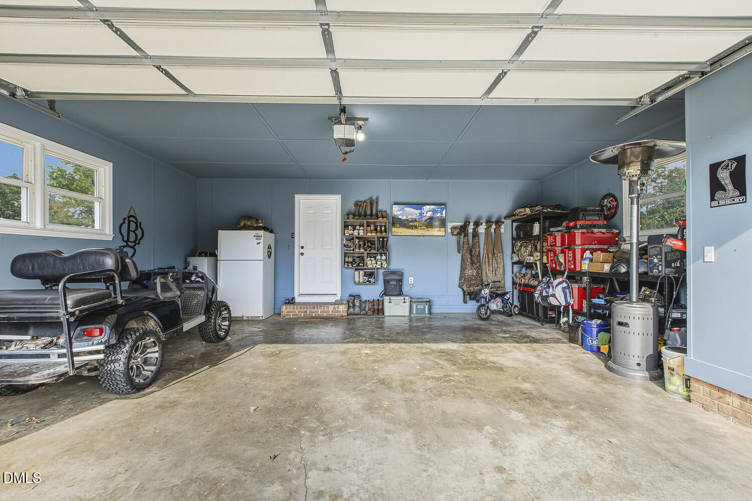 273 Wells Lane Angier, NC 27501 - Photo 37 of 52 a view of a storage room with a lot of stuff