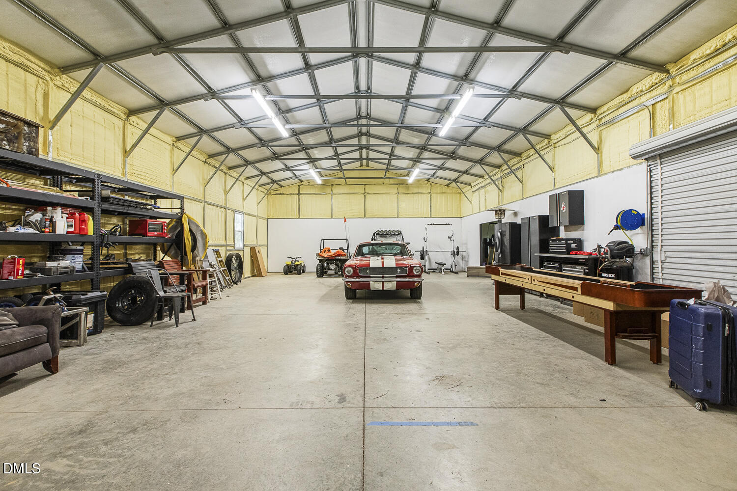 273 Wells Lane Angier, NC 27501 - Photo 41 of 52 a view of parking garage with cars