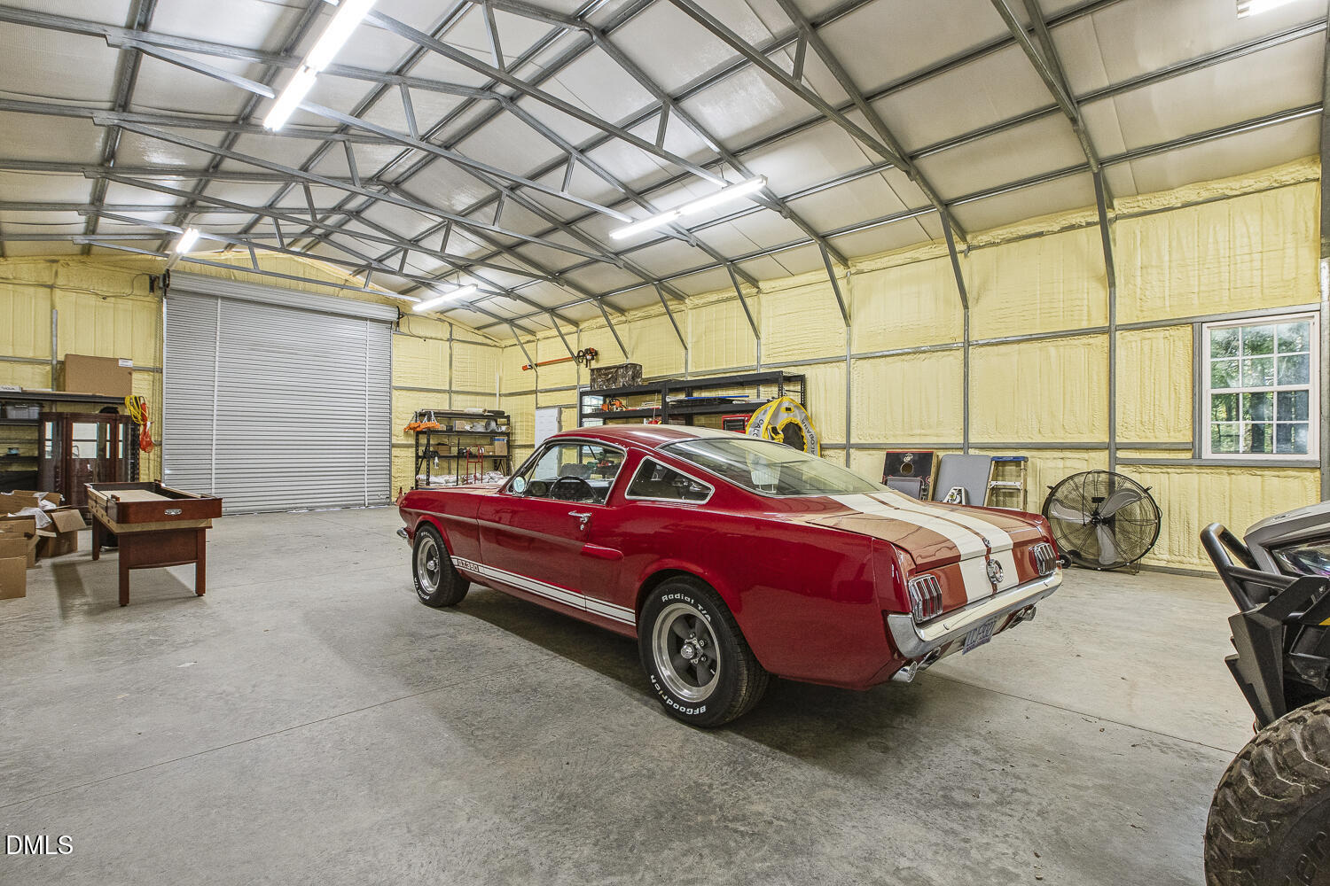 273 Wells Lane Angier, NC 27501 - Photo 42 of 52 a car is parked in a garage