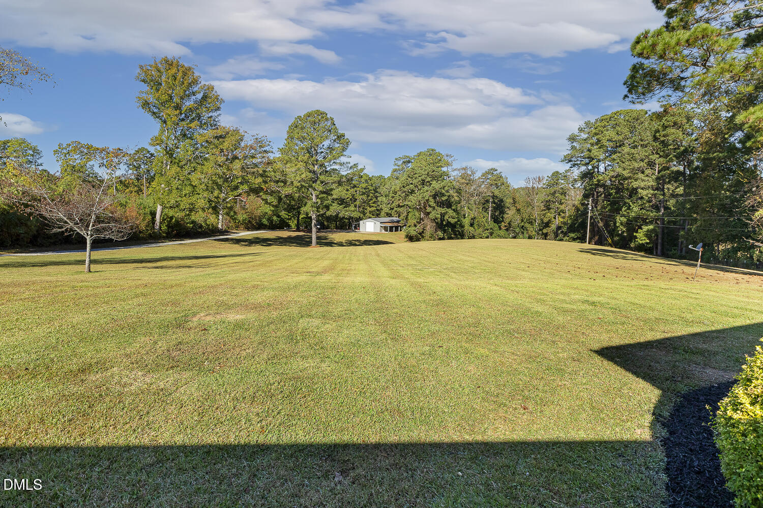 273 Wells Lane Angier, NC 27501 - Photo 43 of 52 a view of an outdoor space and tennis court