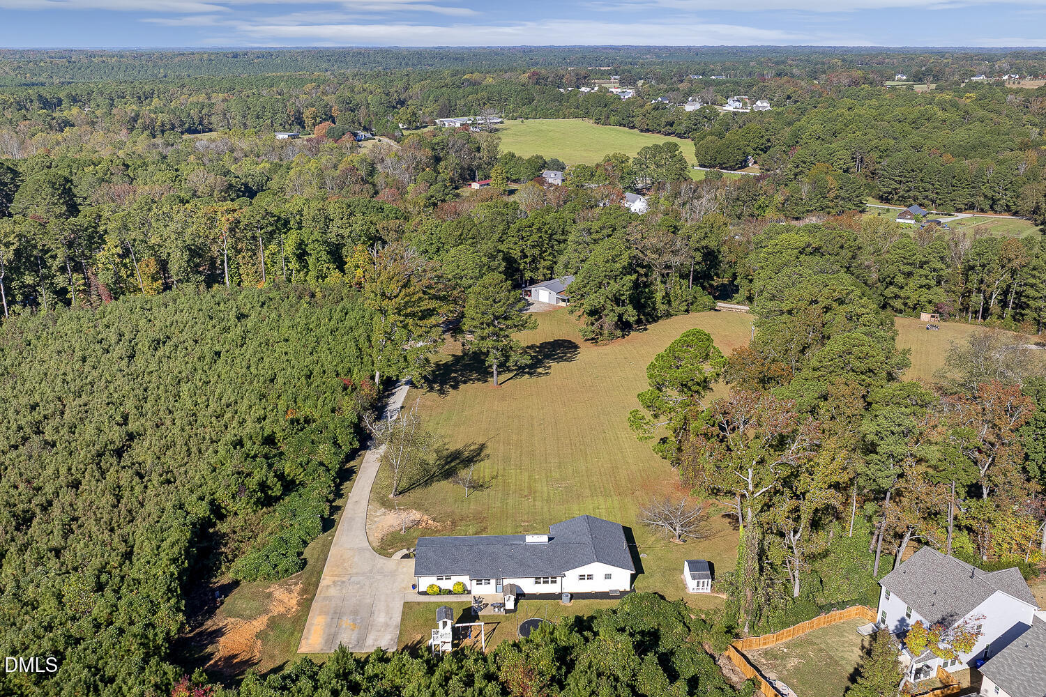 273 Wells Lane Angier, NC 27501 - Photo 49 of 52 an aerial view of mountain with residential house and ocean view